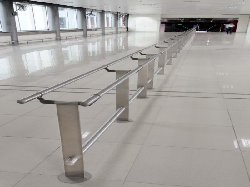 Stainless Steel Central DividerRail with stainless steel uprights at maximum 1200mm centres one in built Skirt railing.